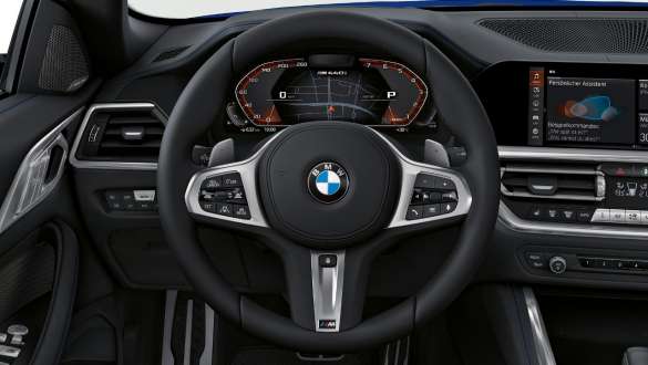 Met leder bekleed M Sportstuurwiel BMW M440i xDrive Cabrio G23 Met leder bekleed M Sportstuurwiel BMW M440i xDrive Cabrio G23 interieur close-up