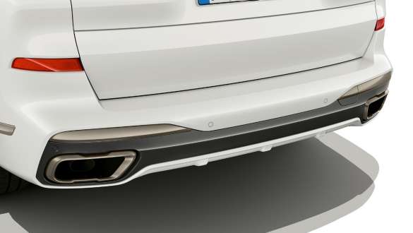 BMW X7 M model met M specifieke uitlaateindpijpen G07 BMW X7 M model met M specifieke uitlaateindpijpen G07 close-up uitlaat