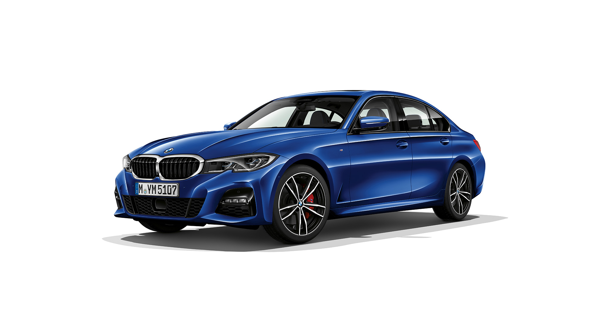 BMW 3 Serie Sedan, Model M Sport Zijaanzicht van een stilstaande BMW 3 Serie Sedan als Model M Sport