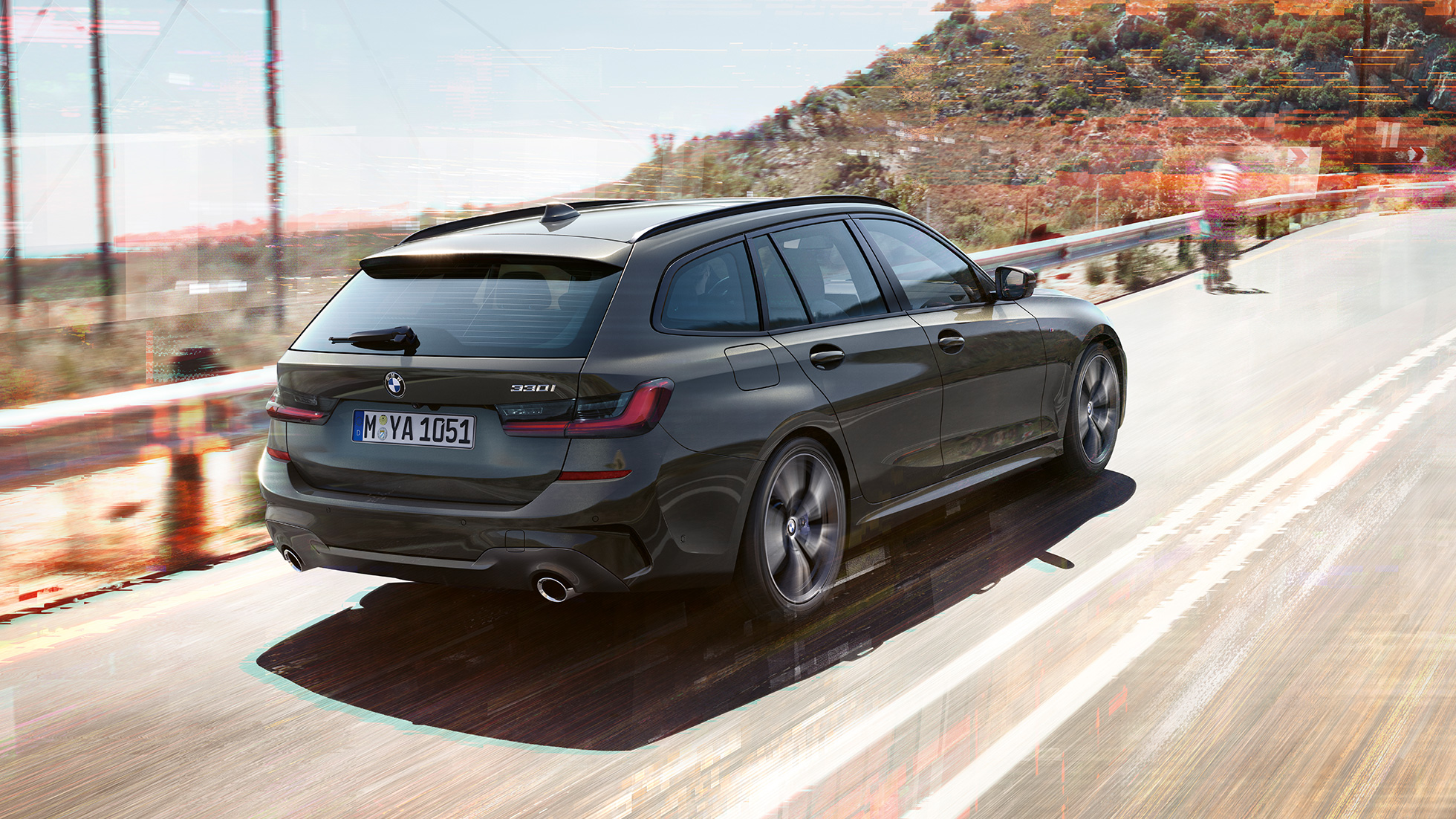 BMW 3 Serie Touring, driekwart achteraanzicht BMW 3 Serie Touring, driekwart achteraanzicht op brug