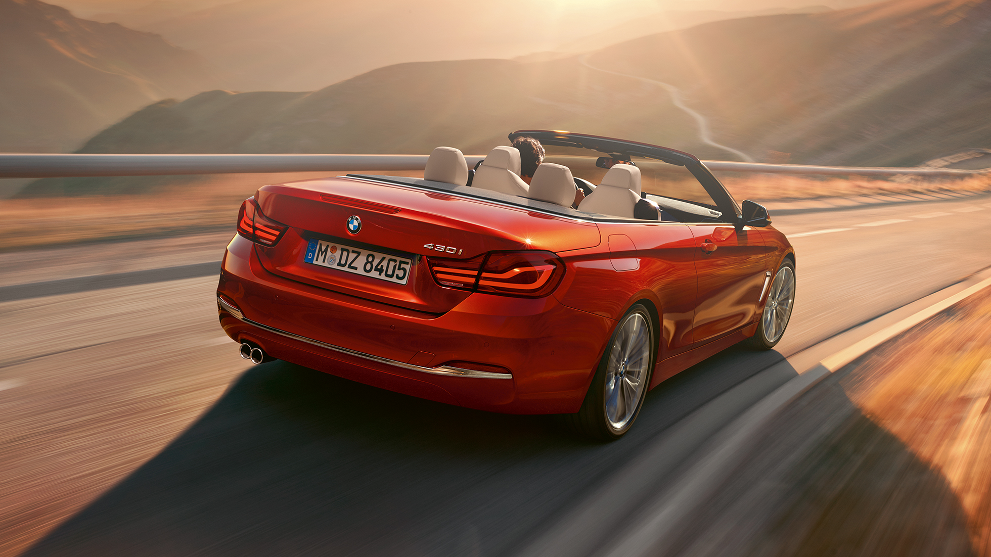 BMW 4 Serie Cabrio, achterzijde rijdend BMW 4 Serie Cabrio, achterzijde rijdend