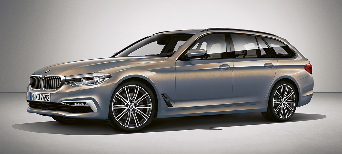 BMW Individual BMW 5 Serie Touring BMW Individual BMW 5 Serie Touring G31 Champagner Quarz metallic driekwart zijaanzicht