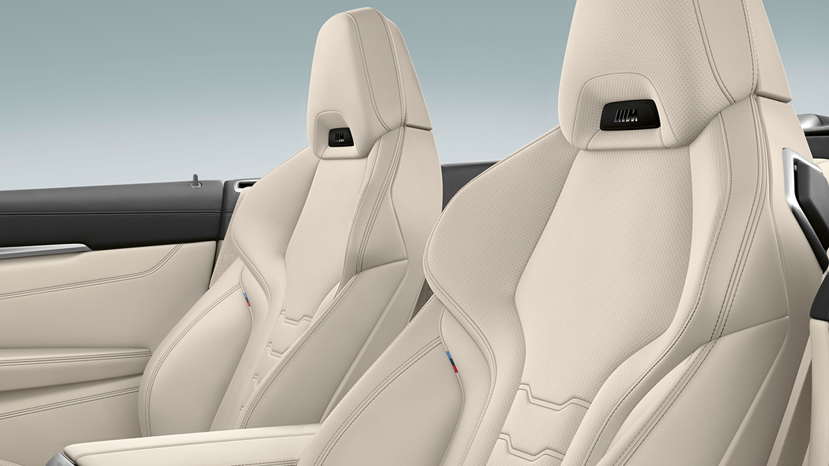 BMW M850i xDrive, multifunctionele stoelen met bekleding in leder Merino Elfenbeinweiß en nekverwarming. BMW M850i xDrive, multifunctionele stoelen met bekleding in leder Merino Elfenbeinweiß en nekverwarming.