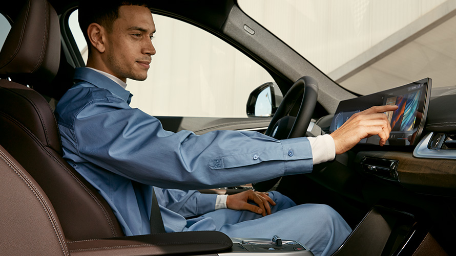 BMW iX1 U11 BEV interieur touchbediening BMW iX1 U11 BEV interieur bestuurder touchbediening Curved Display