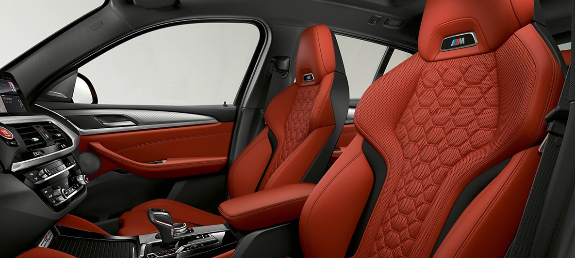 BMW X4 M, sportstoelen in ‘Merino‘ leder Sakhir Orange. BMW X4 M, interieur, sportstoelen in ‘Merino‘ leder Sakhir Orange.