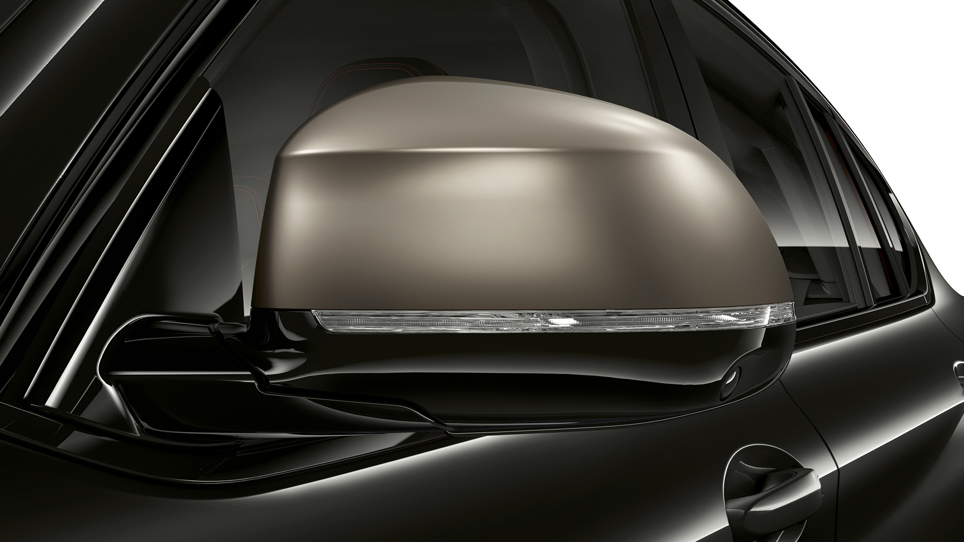 BMW X4 M40i en BMW X4 M40d, spiegelkappen. BMW X4 M40i en BMW X4 M40d in Saphir schwarz metallic, exterieur, gegalvaniseerde spiegelkappen in Cerium Grey.