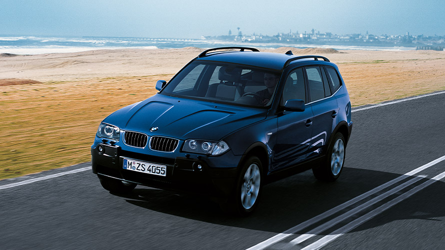 BMW X3 E83 eerste generatie driekwart vooraanzicht rijdend BMW X modellen BMW X3 E83 eerste generatie driekwart vooraanzicht rijdend
