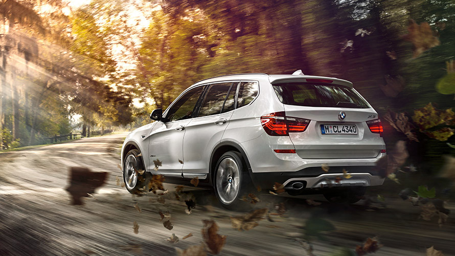 BMW X3 F25 tweede generatie driekwart achteraanzicht rijdend BMW X modellen BMW X3 F25 tweede generatie driekwart achteraanzicht rijdend