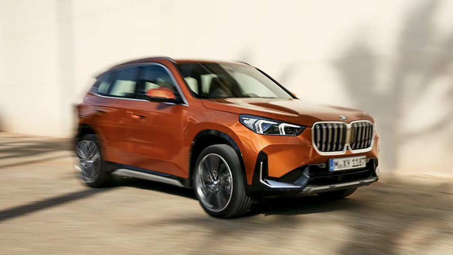 BMW X1 U11 ICE xLine rijdynamiek BMW X1 U11 ICE xLine Utah Orange metallic rijdynamiek