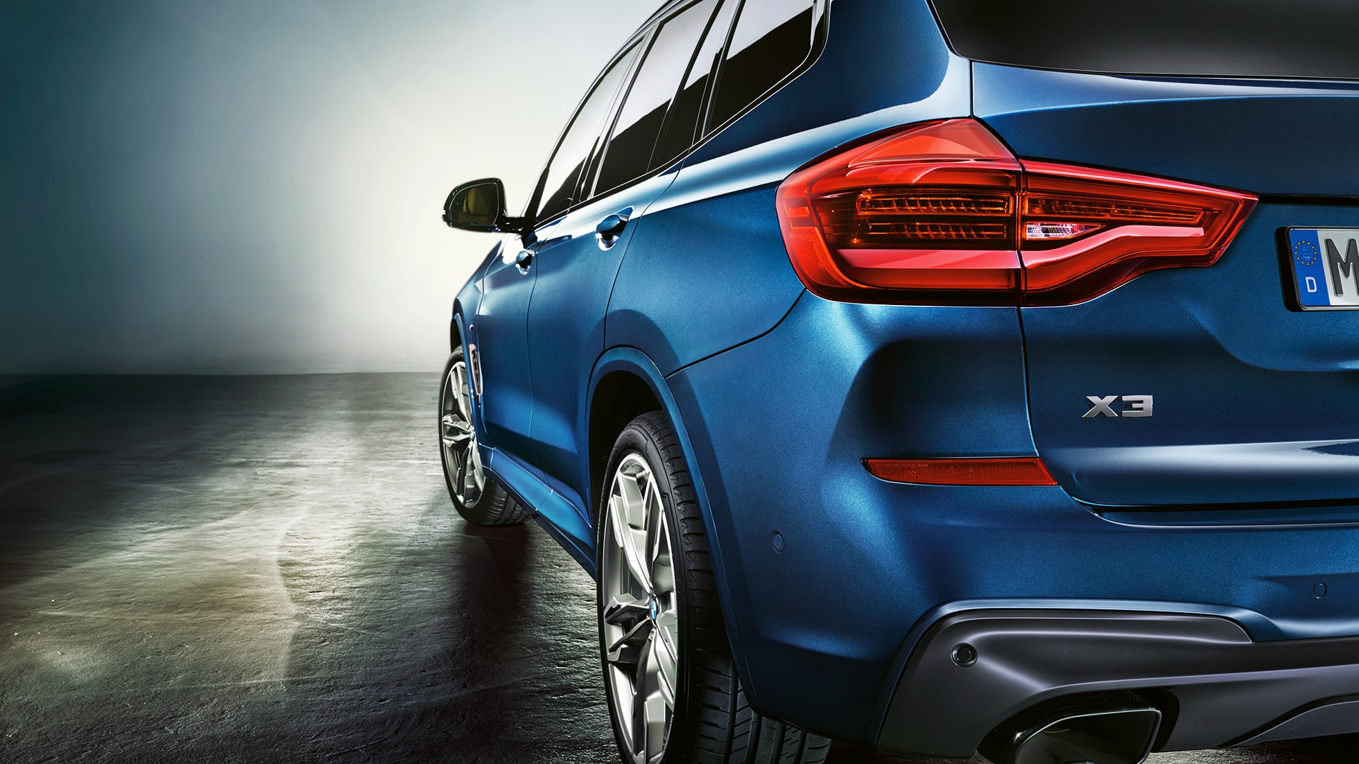 BMW X3 M40i, driekwart achteraanzicht met LED-achterlichten BMW X3 M40i, driekwart achteraanzicht met LED-achterlichten