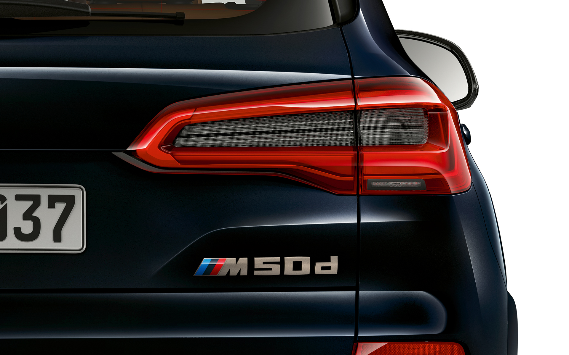 Opschrift achterzijde BMW X5 M50d Modelaanduiding van de BMW X5 M50d in detail