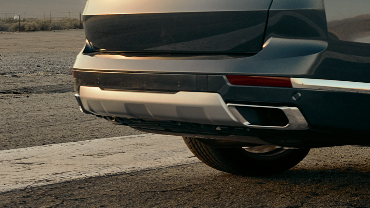 M Sportuitlaatsysteem Close-up van de achterzijde van de BMW X7 met focus op M Sportuitlaatsysteem
