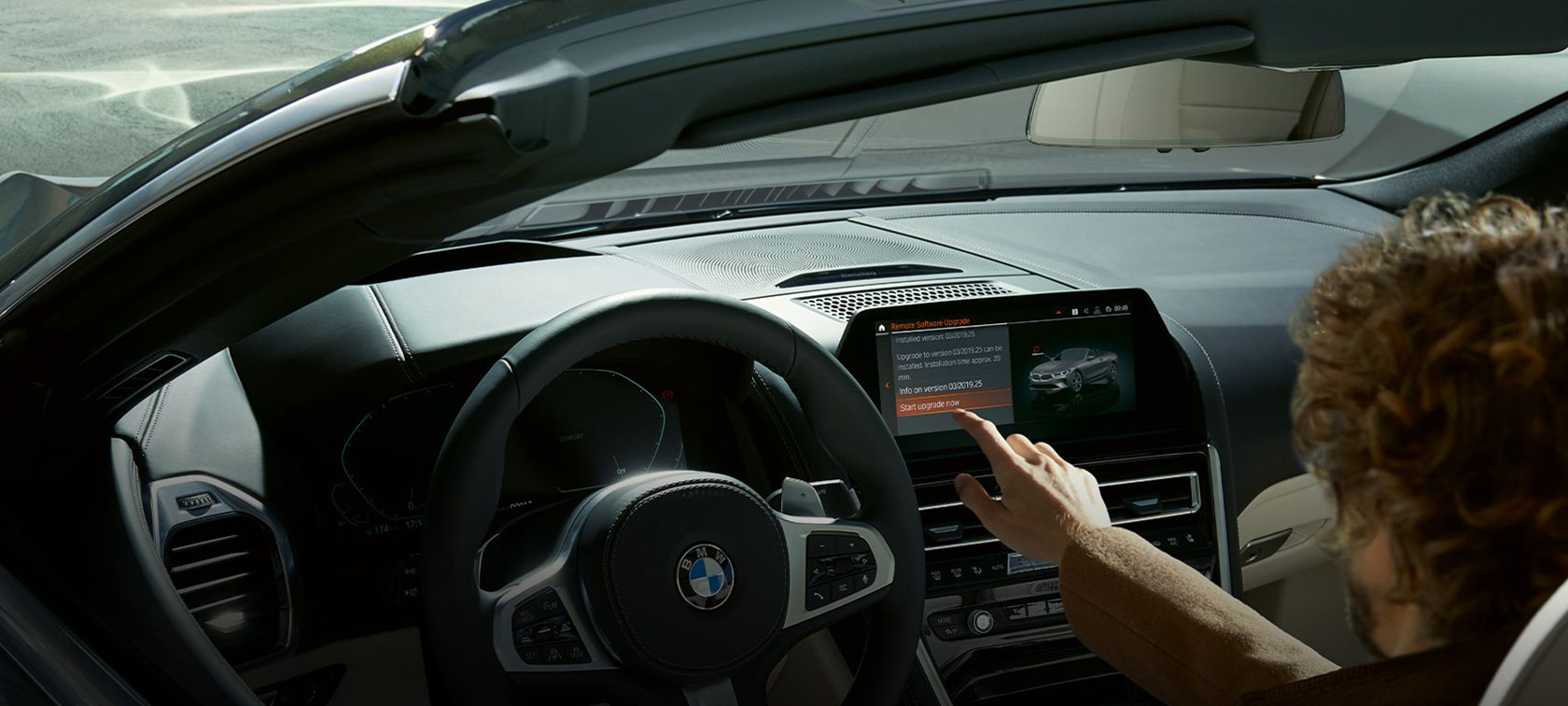 BMW Remote Software Upgrade Man in BMW start BMW Remote Software Upgrade